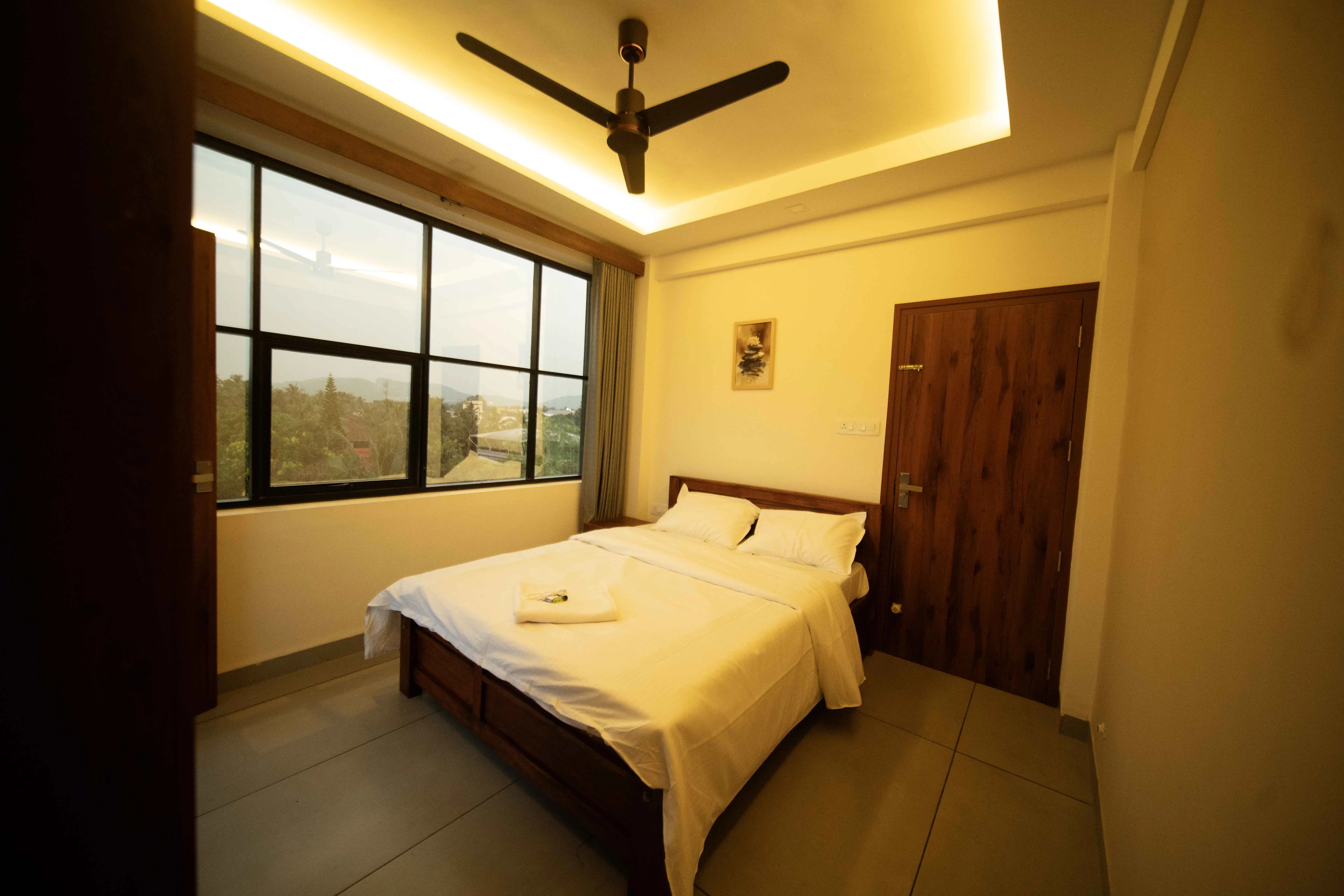 Spezio Apartments furnished bedroom interior