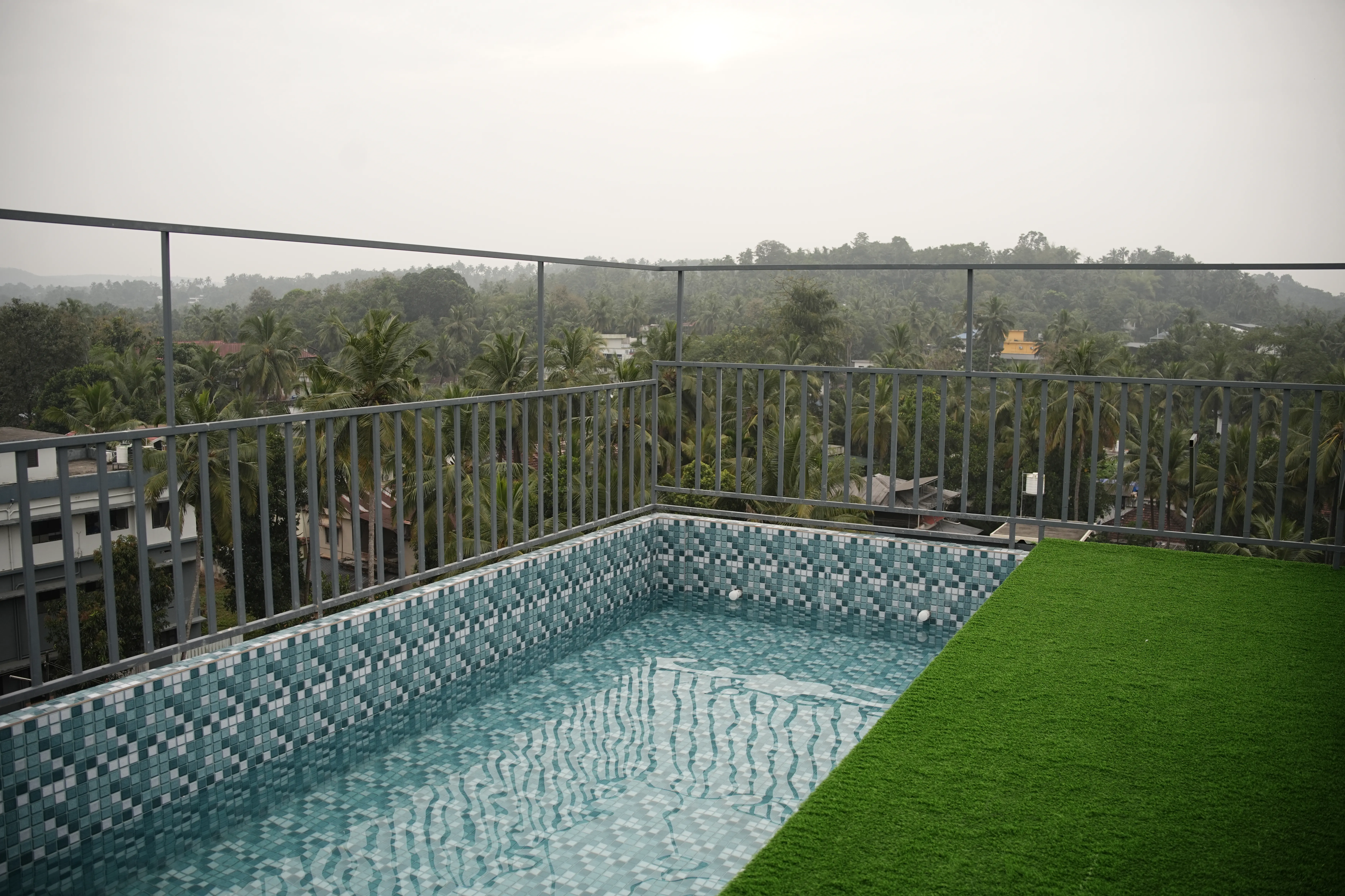 Spezio Apartments rooftop swimming pool Perinthalmanna